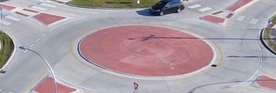 Vehicle enters mini-roundabout