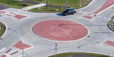 Vehicle enters mini-roundabout