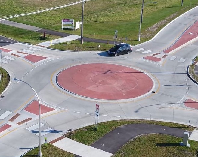 Vehicle enters a mini-roundabout